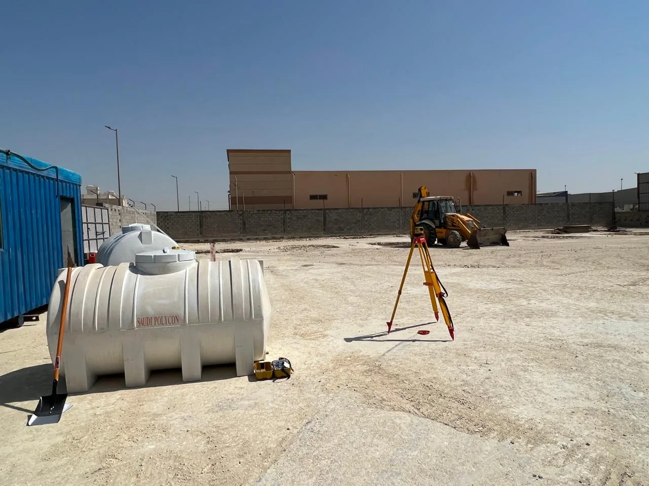 Site survey setting-out and tank installation.