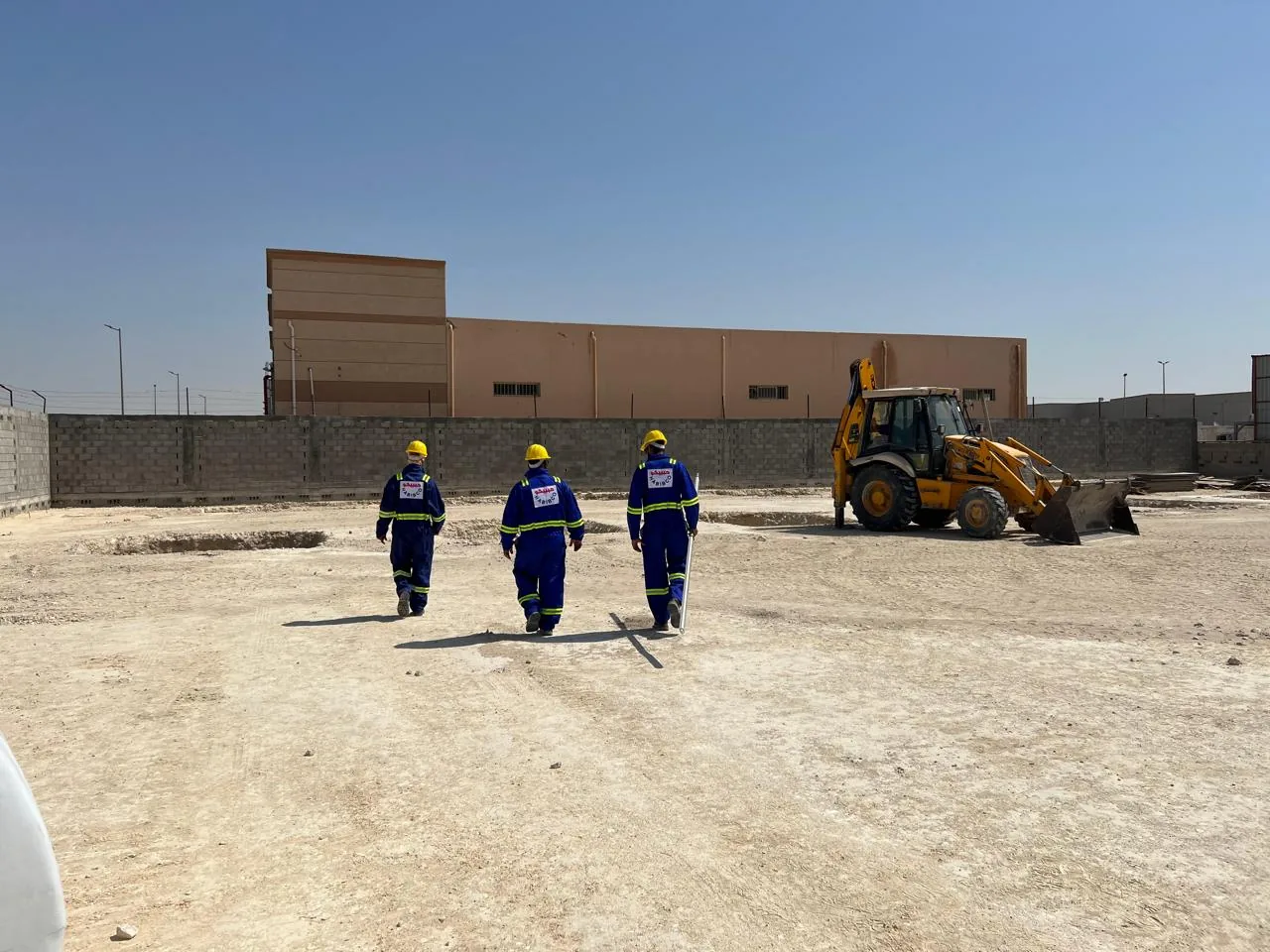 Site crew and earthmoving plant at work.