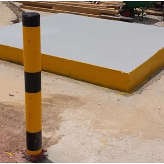 Construction of foundations and installation of barricade posts.