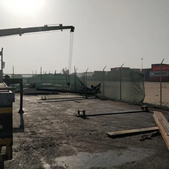 Boundary fencing installation at a port terminal.