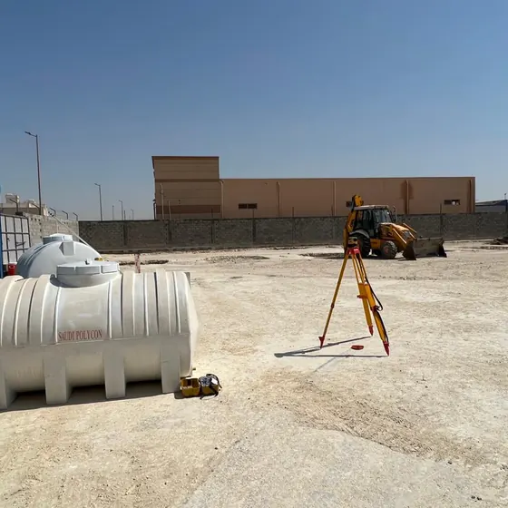 Site survey setting-out and tank installation.