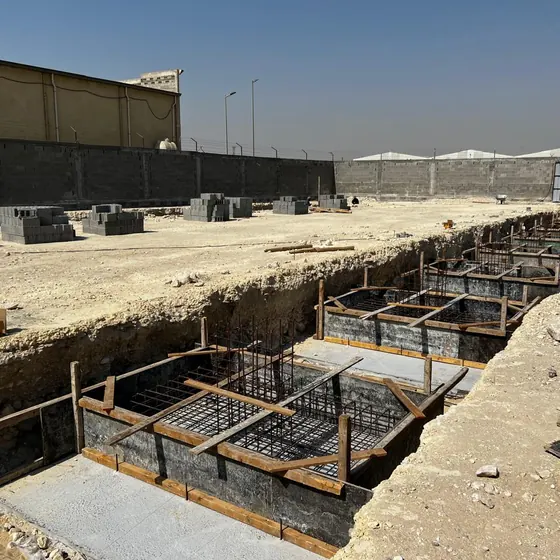 Foundation excavation and steel reinforcement.