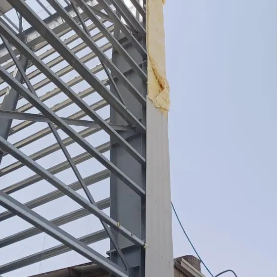 Structural steel frame erection on site.