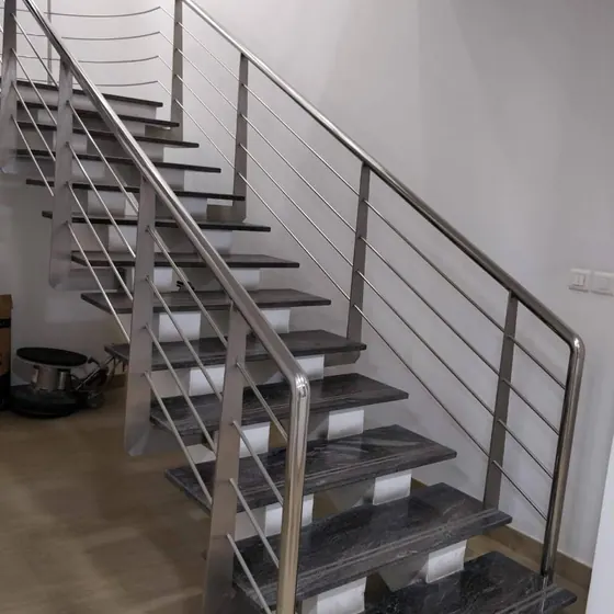 Stainless steel staircase fabrication and installation.